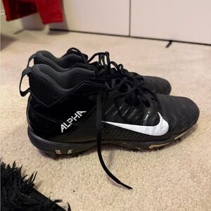 Nike Alpha Black and White Sports Cleats